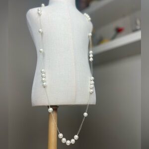 Long floating faux pearl gold threaded necklace
